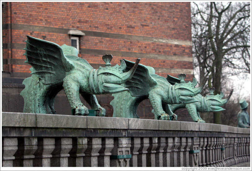 Dragon-like figures in front of R?us (Town Hall).