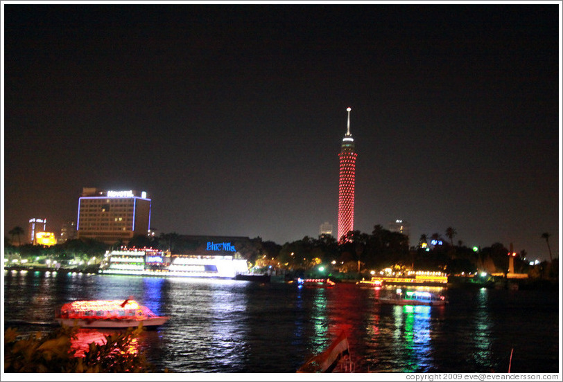 Nile with Cairo Tower in background, at night.