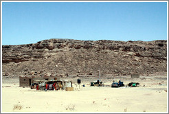 Bedouin dwelling with truck.  Sinai Desert.