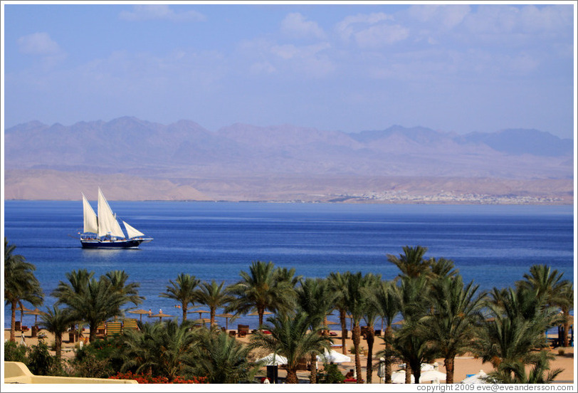 Sailboat in the Red Sea near Taba Heights.  The mountains of Saudi Arabia are in the background.
