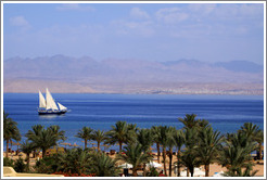 Sailboat in the Red Sea near Taba Heights.  The mountains of Saudi Arabia are in the background.