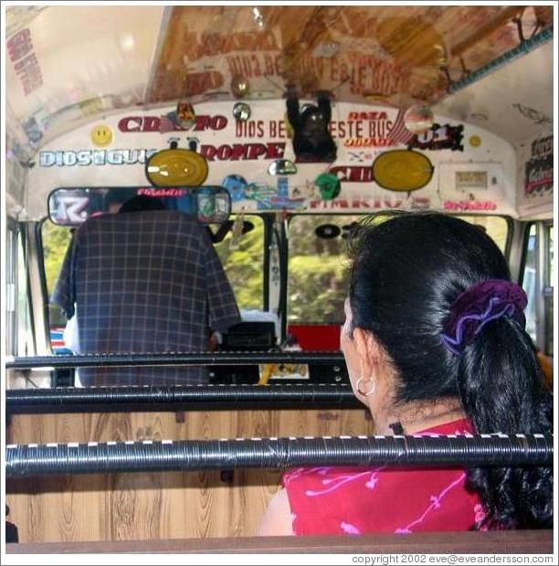 A camioneta: a North American school bus, brightly painted and decorated and turned into regular transportation for El Salvadoreans.