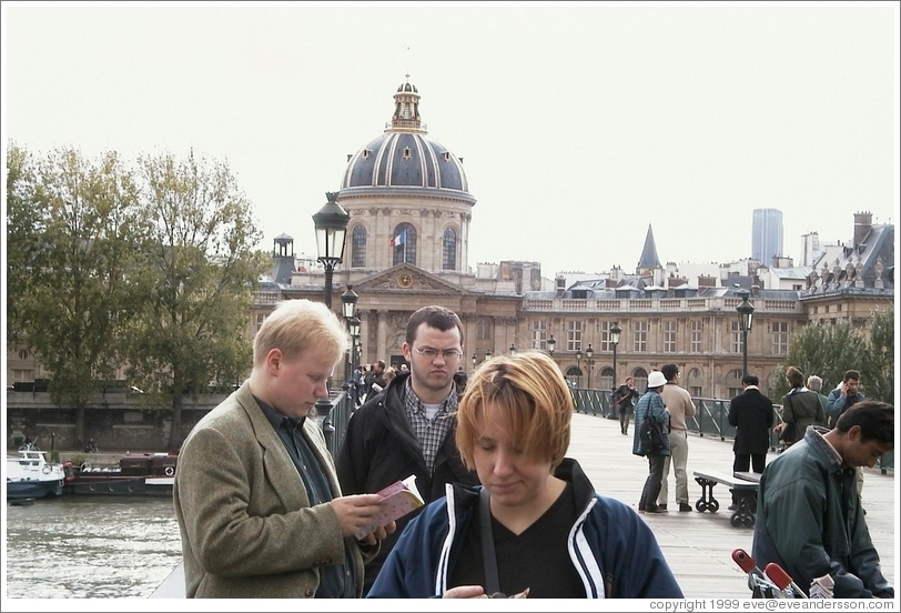 Enjoying chestnuts by the Louvre.