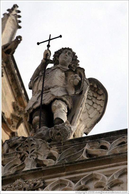 Angel at the top of Cathedrale St-Sauveur.