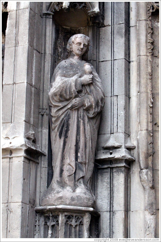 Man with a wine goblet.  Cathedrale St-Sauveur.