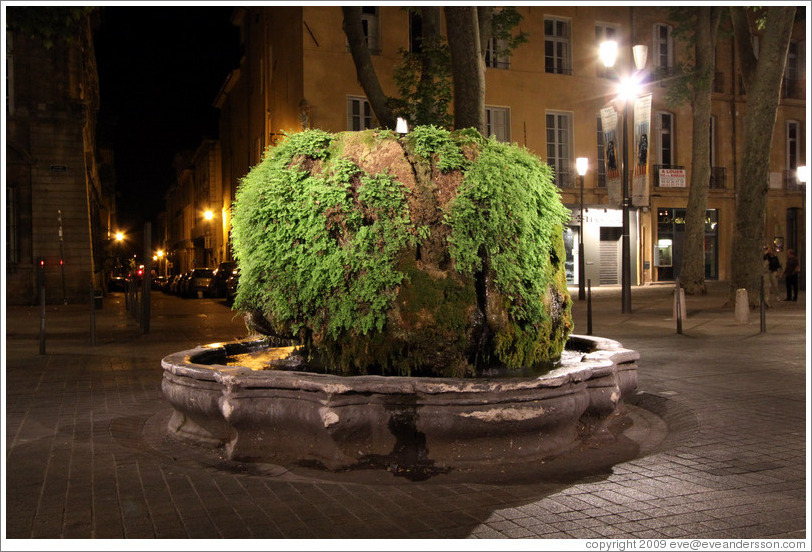 Fontaine d'eau Chaude (Warm Water Fountain) at night.  Built in 1734, fed by a hot spring.  Cours Mirabeau.