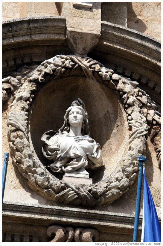 Woman sculpture adorning the facade of the H? de Ville (city hall).