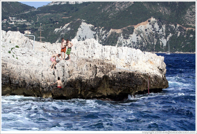 Boys climbing down to the water.  Calanque de Port-Miou