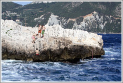 Boys climbing down to the water.  Calanque de Port-Miou