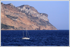Sailboat in front of the calanques of Marseilles, viewed from Cassis.