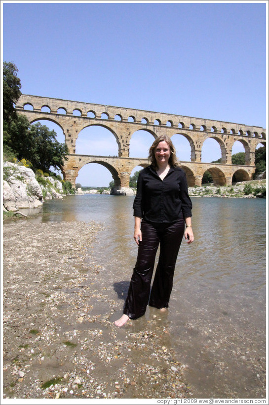 Eve, soaking wet after getting into the water chest-deep to photograph the Pont du Gard.