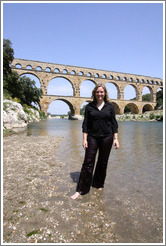 Eve, soaking wet after getting into the water chest-deep to photograph the Pont du Gard.