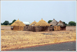 Village at the side of North Bank Road.