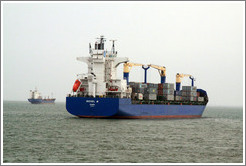 Cargo ship with the name "Michel" printed on it.