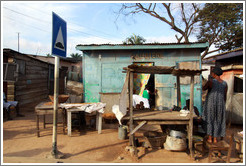 A store called Abotere, and the back of a woman.