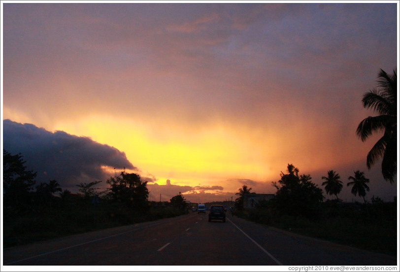 Sunset over Cape Coast road.