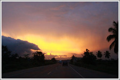 Sunset over Cape Coast road.