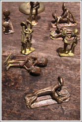 Bronze figures copulating. Centre For National Culture textiles market.