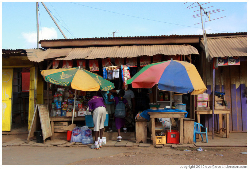 Roadside shop with umbrellas.