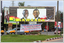 Billboard reading Partnership for Change / Akwaaba, with photos of the president of Ghana, John Atta Mills, and the president of the United States, Barack Obama.