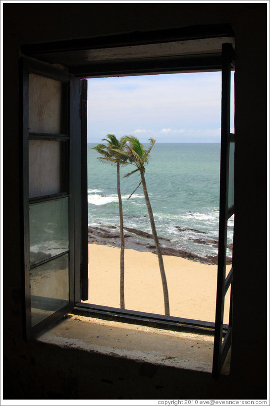 View of the coast through a window in Elmina Castle.