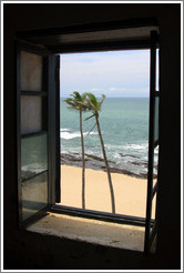 View of the coast through a window in Elmina Castle.