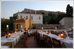 &#917;&#955;&#945;&#953;&#945; restaurant.  Rooftop dining area with the Acropolis (&#913;&#954;&#961;&#972;&#960;&#959;&#955;&#951;) behind it.