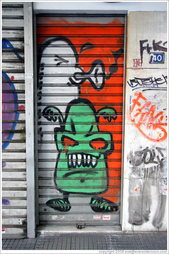 Graffiti depicting aliens.