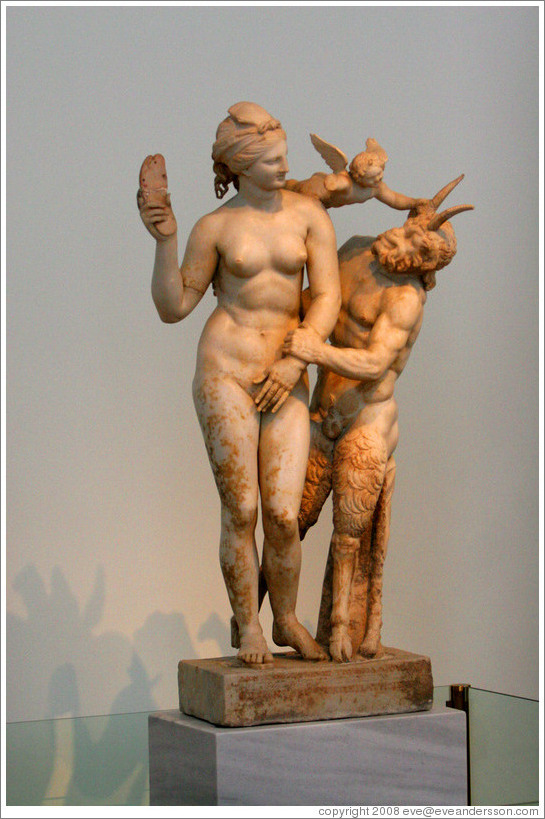 Statue of Aphrodite, Eros, and Pan from 180 AD. National Archaeological Museum. 