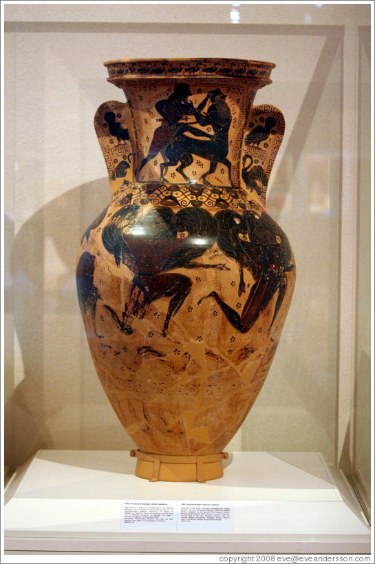 Attic black figure funerary amphora depicting the myth of Perseus beheading Gorgon Medusa from 620-610 BC.  National Archaeological Museum.