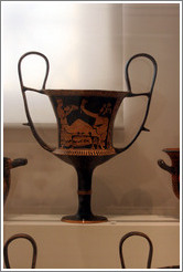 Red figure kantharos depicting a female bringing an offering to the god Kabeiros, from 420 BC.  National Archaeological Museum.