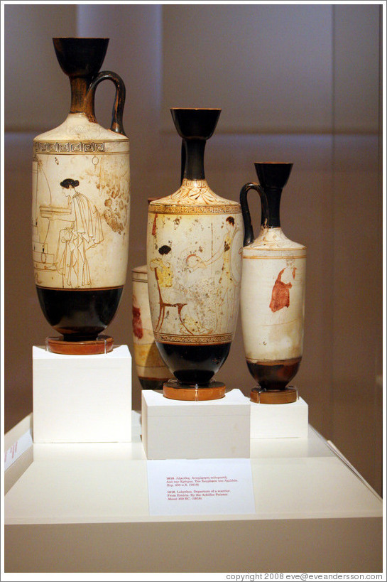 Three lekythoi from Eretria.  Left: by the Bosanquet Painter, 450-440 BC.  Center: by the Achilles Painter depicting the departure of a warrior, around 450 BC.  Right: from around 420 BC.