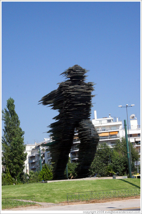 Statue of a running man.