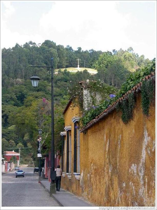 Antigua, Guatemala.  Steet; Cerro de la Cruz in the background.