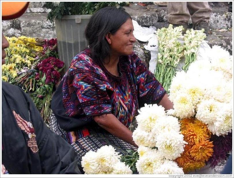 Woman selling flowers.