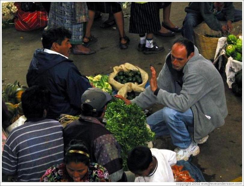 Bargaining for food at the market.