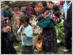 Girl and woman, food market.