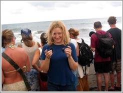 Eve holding two baby turtles.