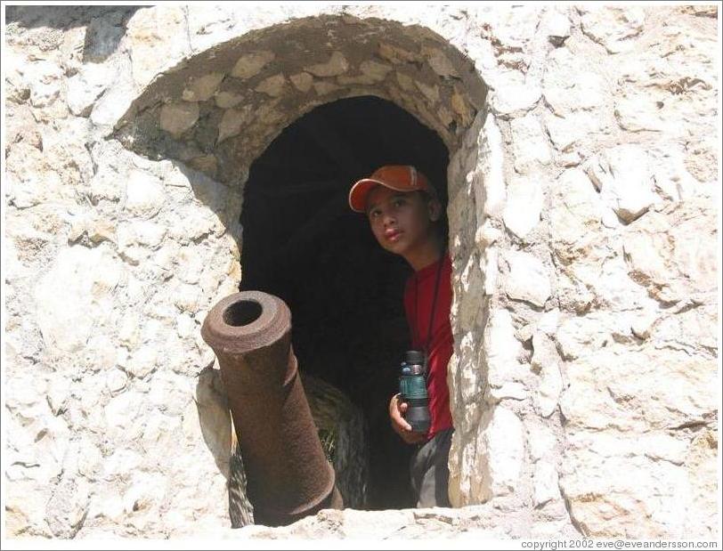 Castillo de San Felipe.  Boy and cannon.