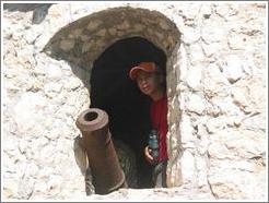 Castillo de San Felipe.  Boy and cannon.