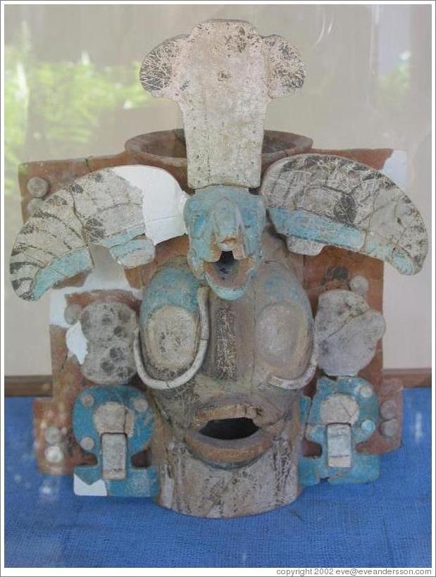 Tikal.  Ceramic face at the Ceramic Museum.