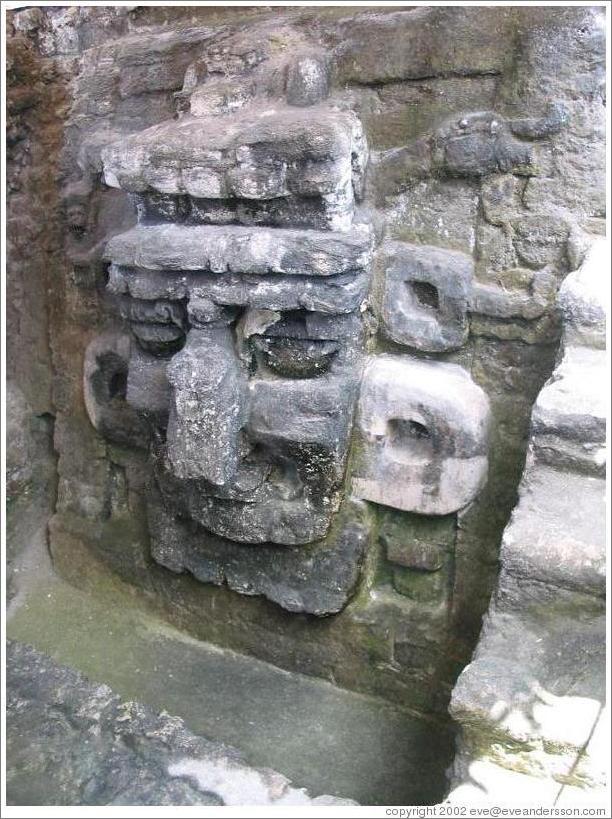 Tikal.  Carved face, North Acropolis.