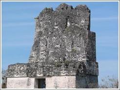 Tikal.  Crest of Templo II.  You can still make out some of the original carvings.