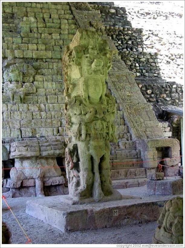 Estela M in front of hieroglyphic stairway.