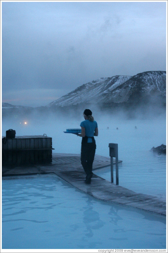 Woman serving drinks at the Blue Lagoon.