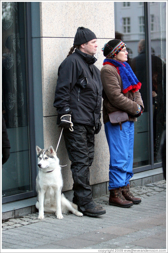 Couple and husky.