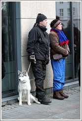 Couple and husky.