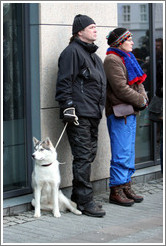 Couple and husky.