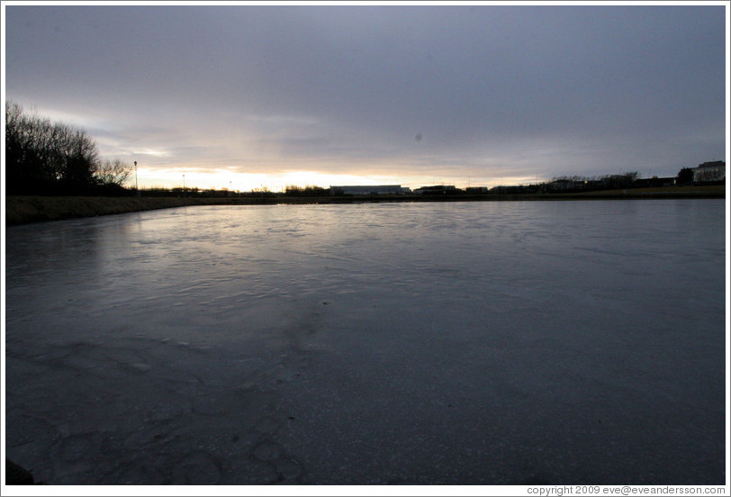 Ice covering Tj?rnin (The Pond).