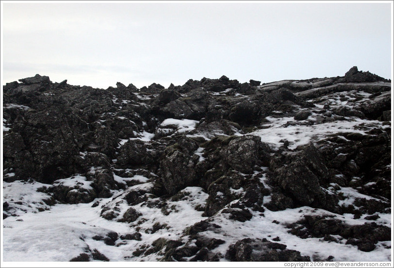 Snow-covered volcanic terrain.